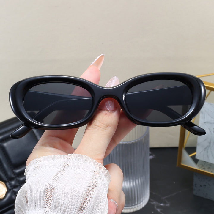 Women's fashionable sunglasses with oval design and UV protection Stornfield