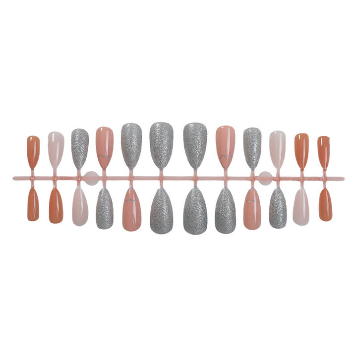 Acrylic nail set with heart and glitter design Stornfield