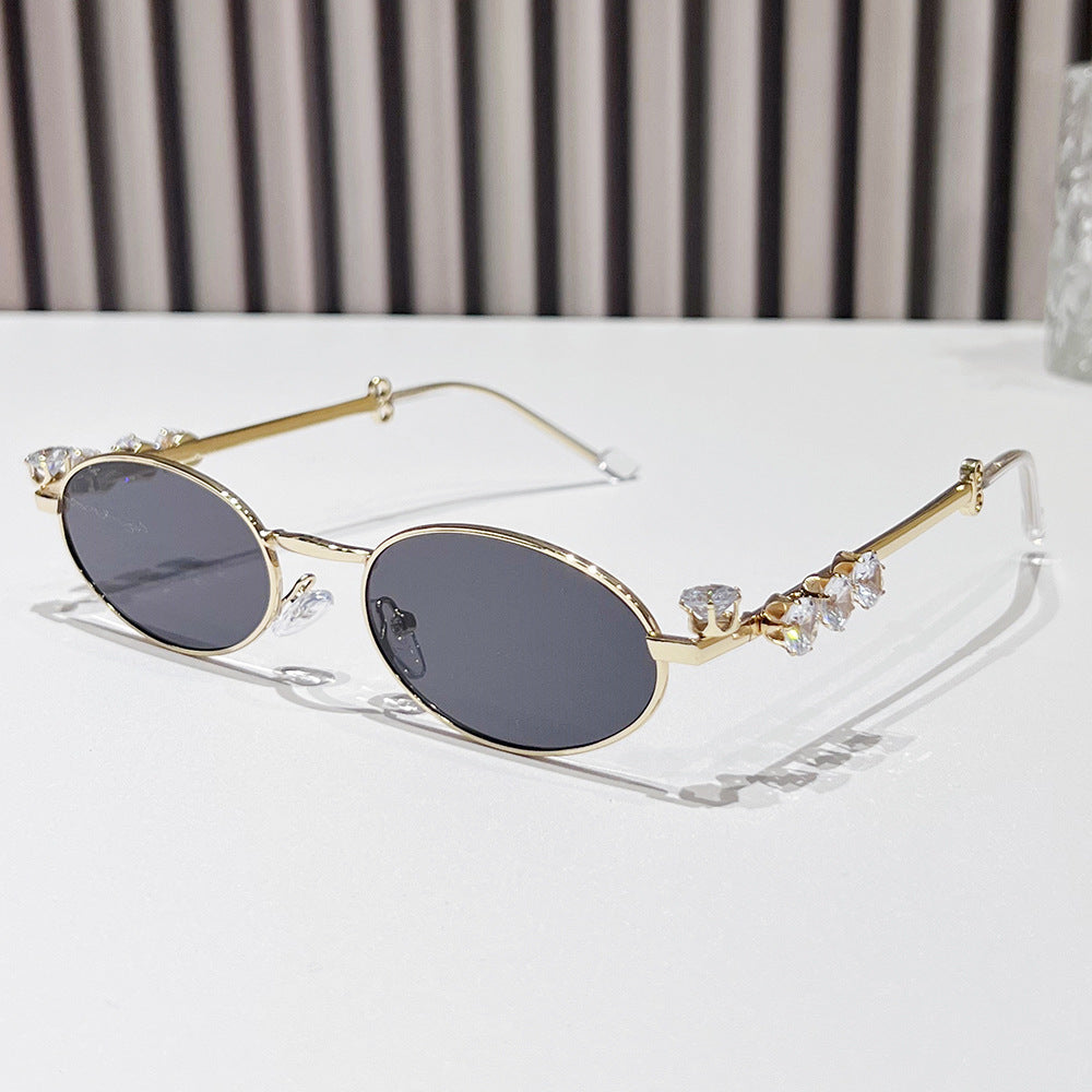 Fashion-Forward Oval Sunglasses with Crystal Accents Stornfield