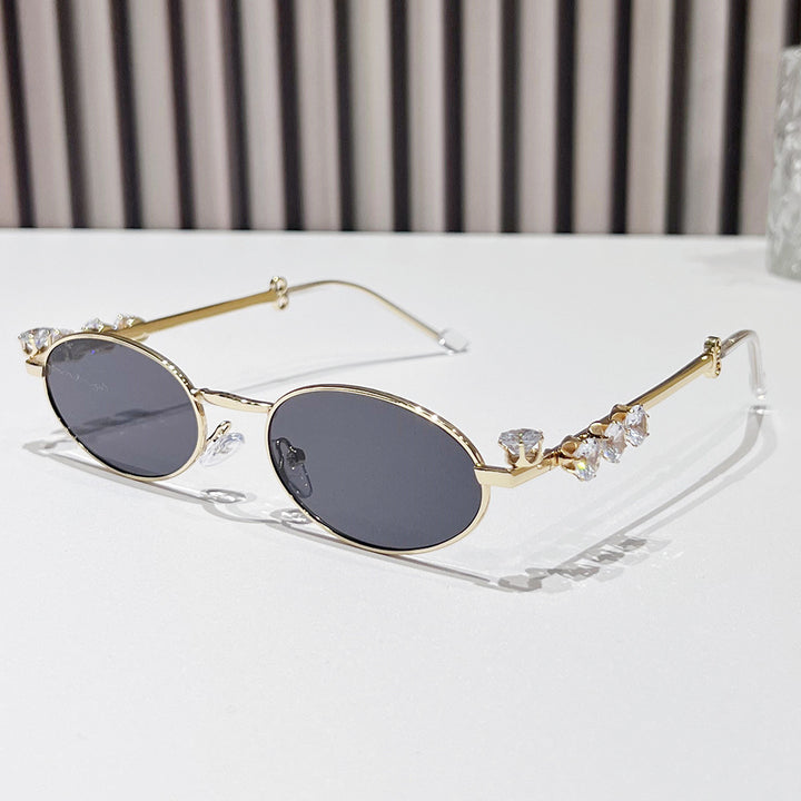 Fashion-Forward Oval Sunglasses with Crystal Accents Stornfield