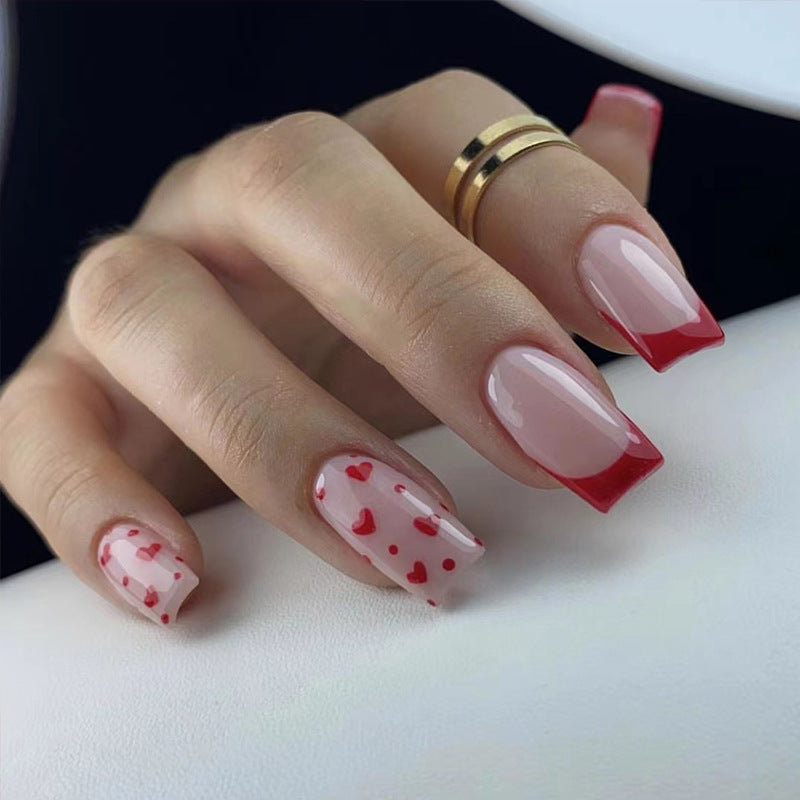 Artful nail extensions with an elegant leaf pattern Stornfield