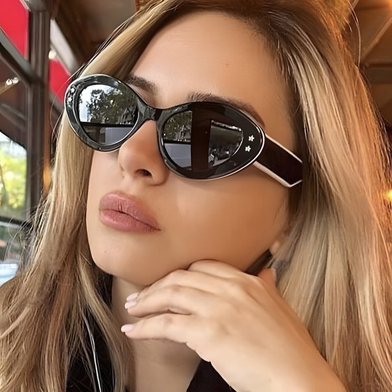 Ladies Cat-Eye Sunglasses with Luxurious Plastic Frame and Decorative Accents Stornfield