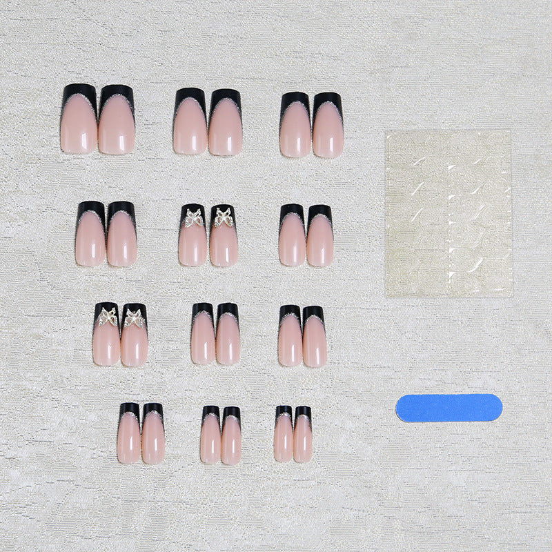 Glamorous artificial nails with detailed decorations Stornfield
