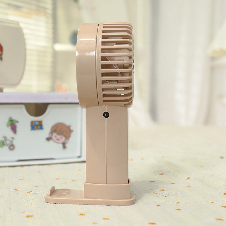 Ladies portable hand fan with variable speed control and ergonomic design Stornfield