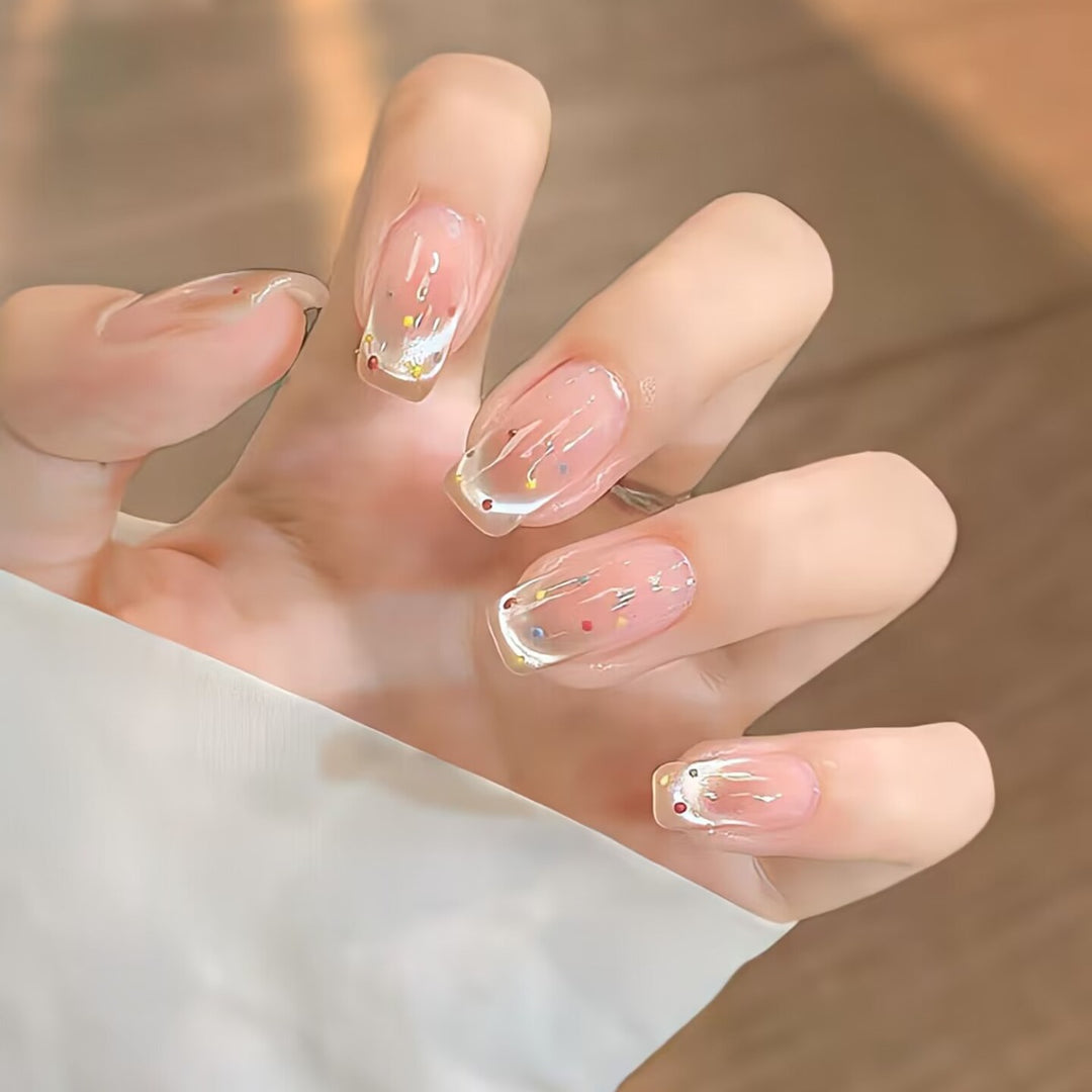 Trendy artificial nails with glitter effects Stornfield