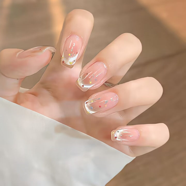 Trendy artificial nails with glitter effects Stornfield