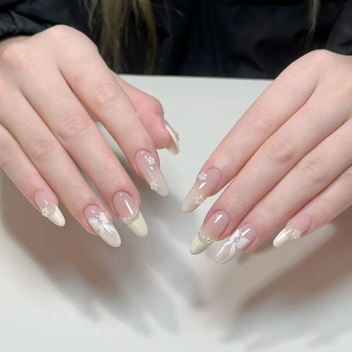 Artistic Almond-Shaped Press-On Nail Set with Elegant Floral Accents Stornfield