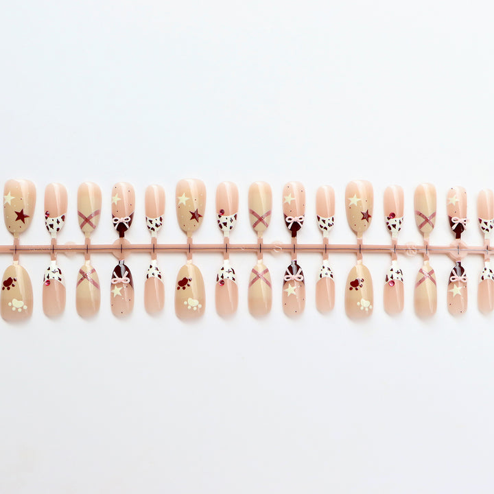 Thematic Press-On Nail Art Set with Charming Designs Stornfield