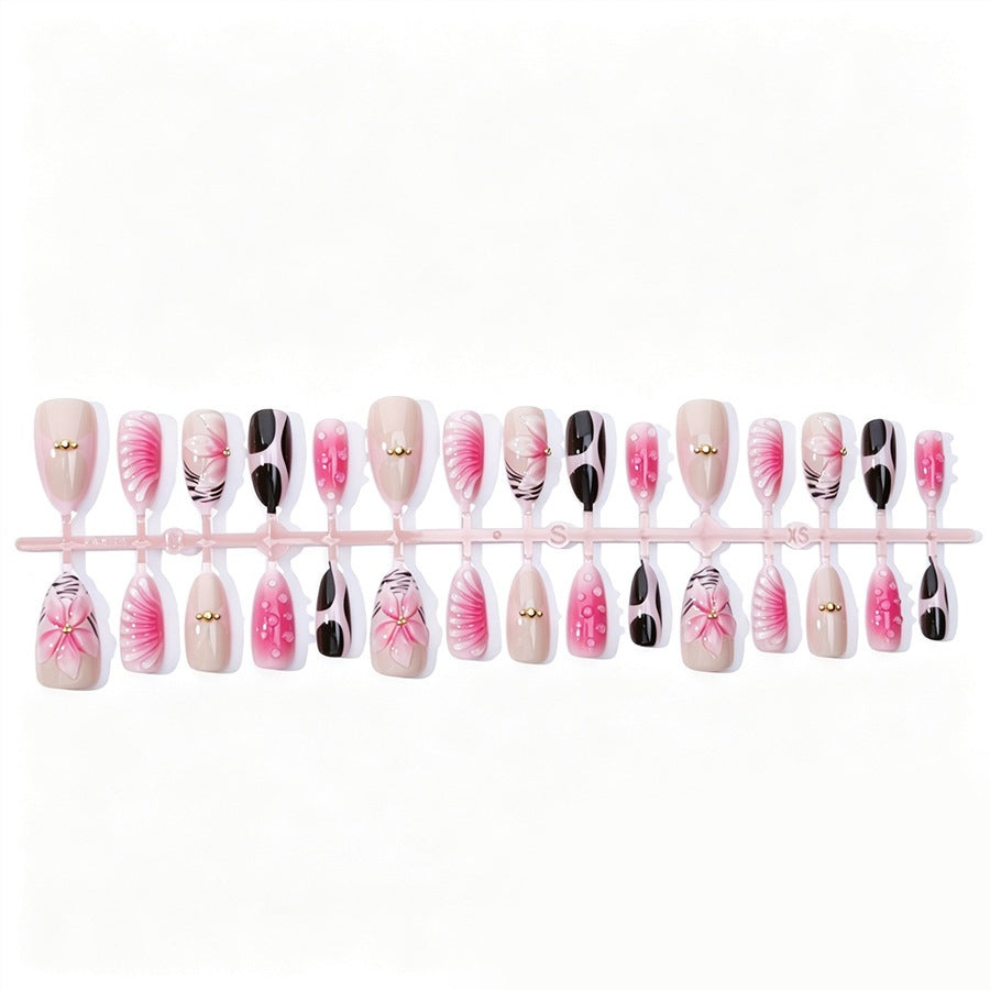 Acrylic nail set with filigree flower and glitter accents Stornfield