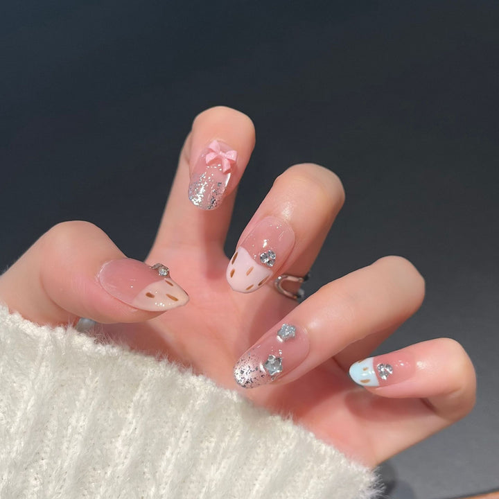 Decorative Press-On Nail Art with Bow and Gem Accents Stornfield