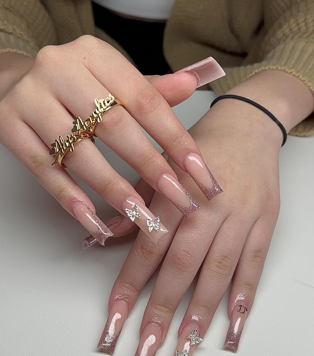Artistic Long Glossy Almond-Shaped Nail Extensions Stornfield
