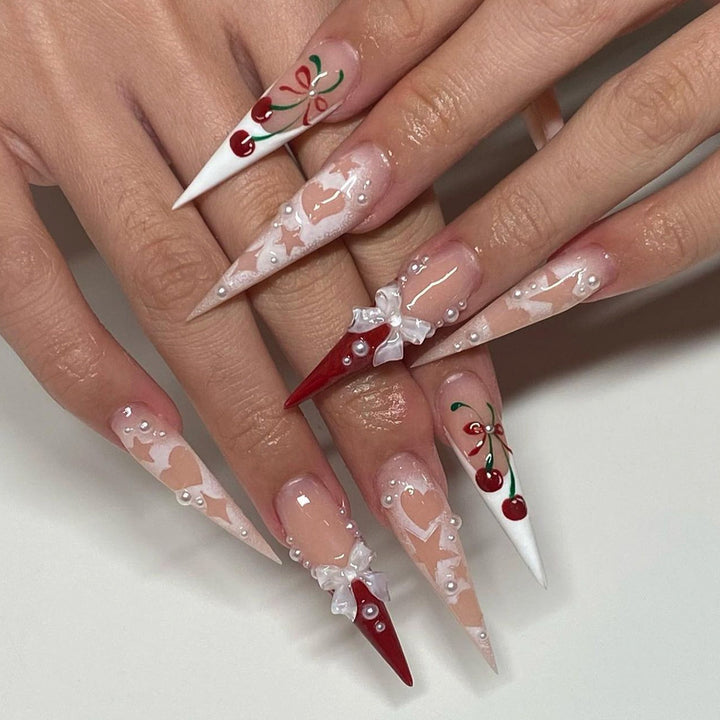Artificial Nail Art with Festive Designs Stornfield