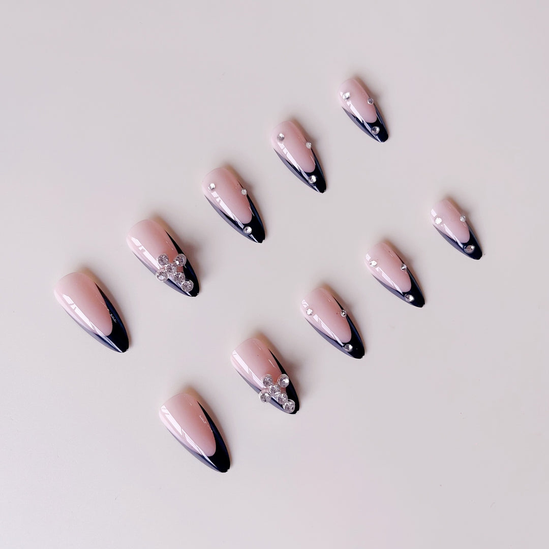Artificial nail set with luxurious French design and radiant accents Stornfield