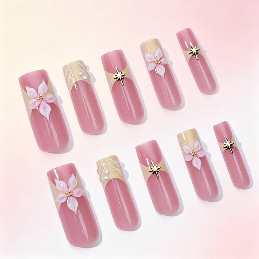 Artificial nail set with delicate flower and glitter elements Stornfield