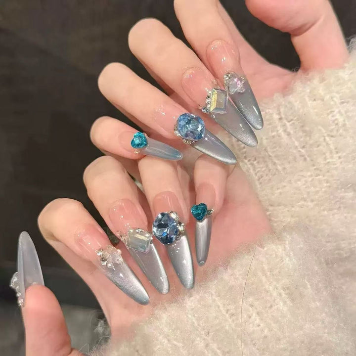 Glamorous artificial nail tips with elegant decorations Stornfield