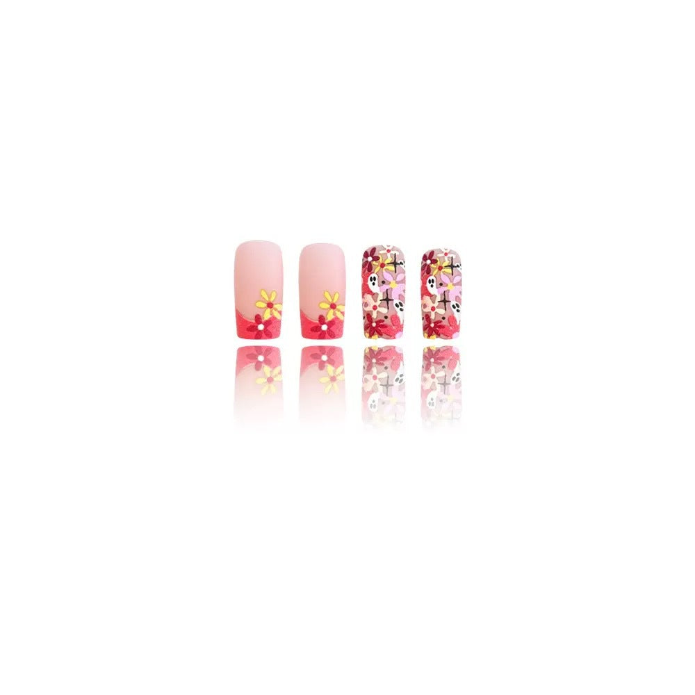 Artificial nail set with playful 3D designs and blooming patterns Stornfield