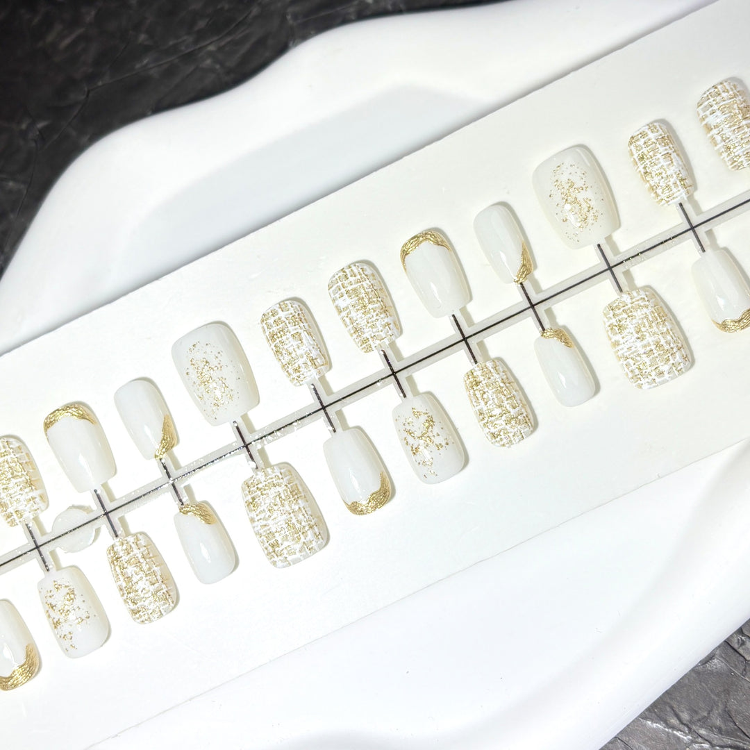 Elegant Press-On Nail Set with Decorative Gold Accents