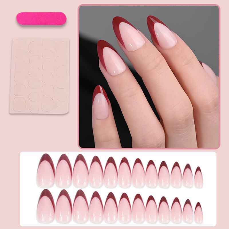 Artificial nail set with elegant French tips and modern accents Stornfield