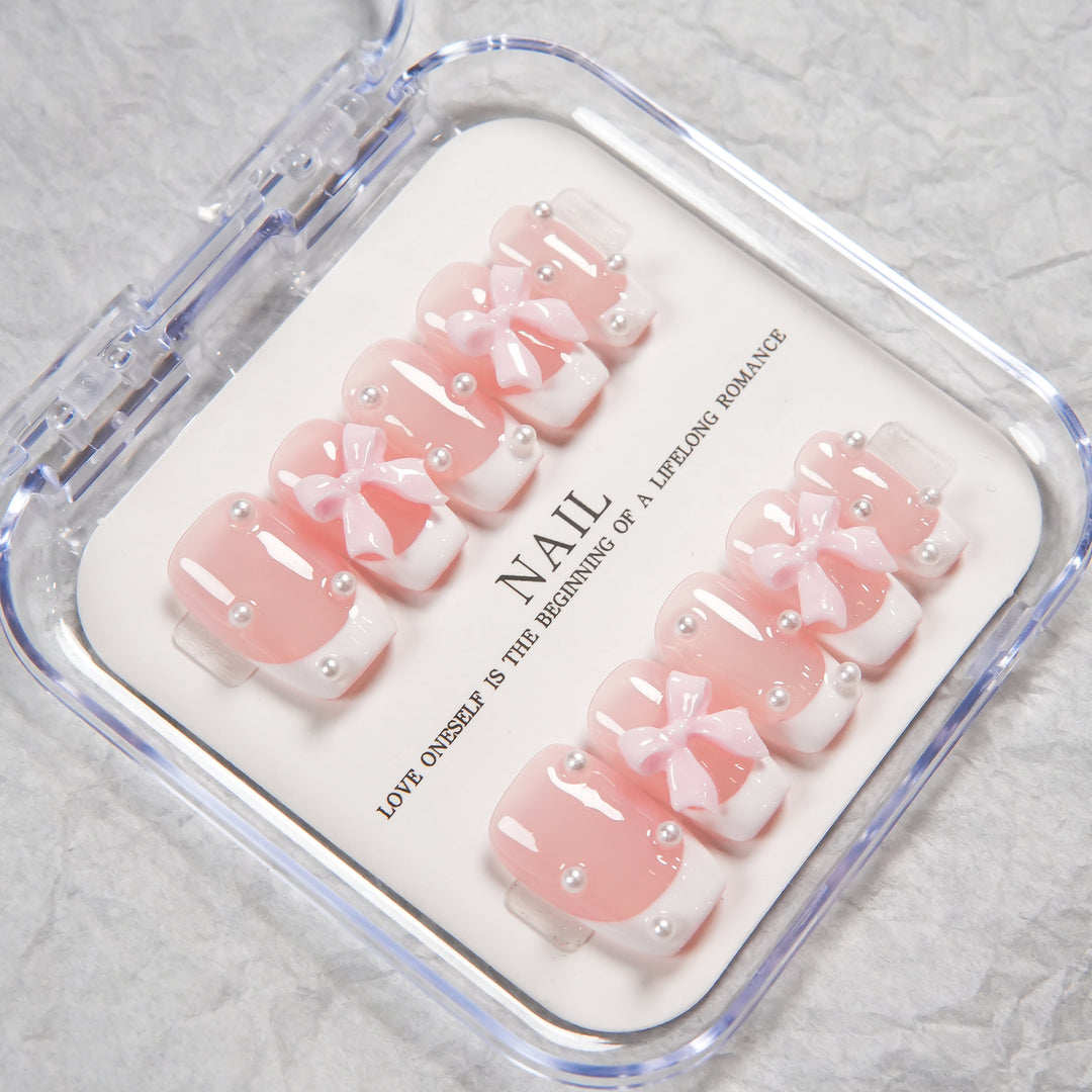 Decorative Press-On Nail Set with Bow and Pearl Accents
