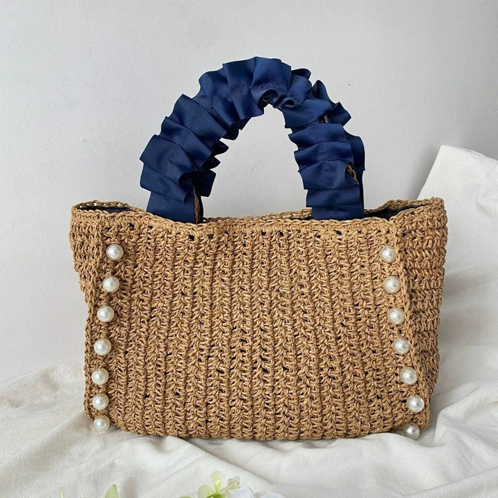 Fashionable straw bag with ruffle detail Stornfield
