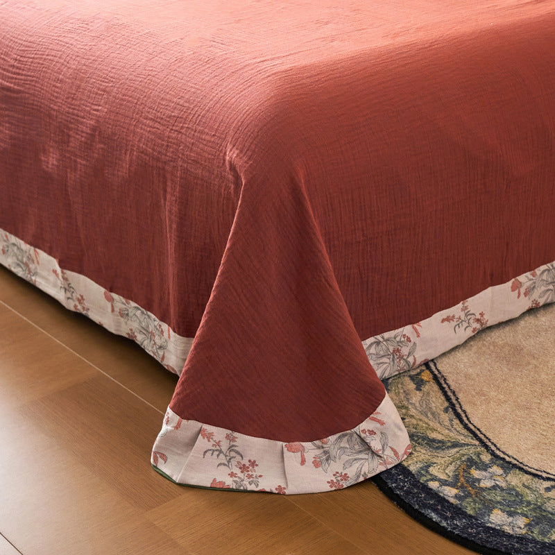 Romantic cotton-linen reversible bedding set with floral print and decorative cords