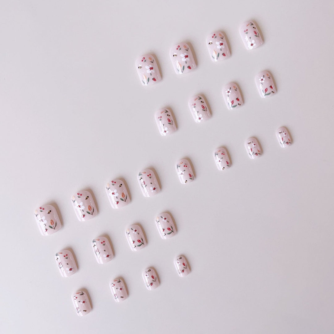Artificial nail set with cheerful flower and bee designs Stornfield