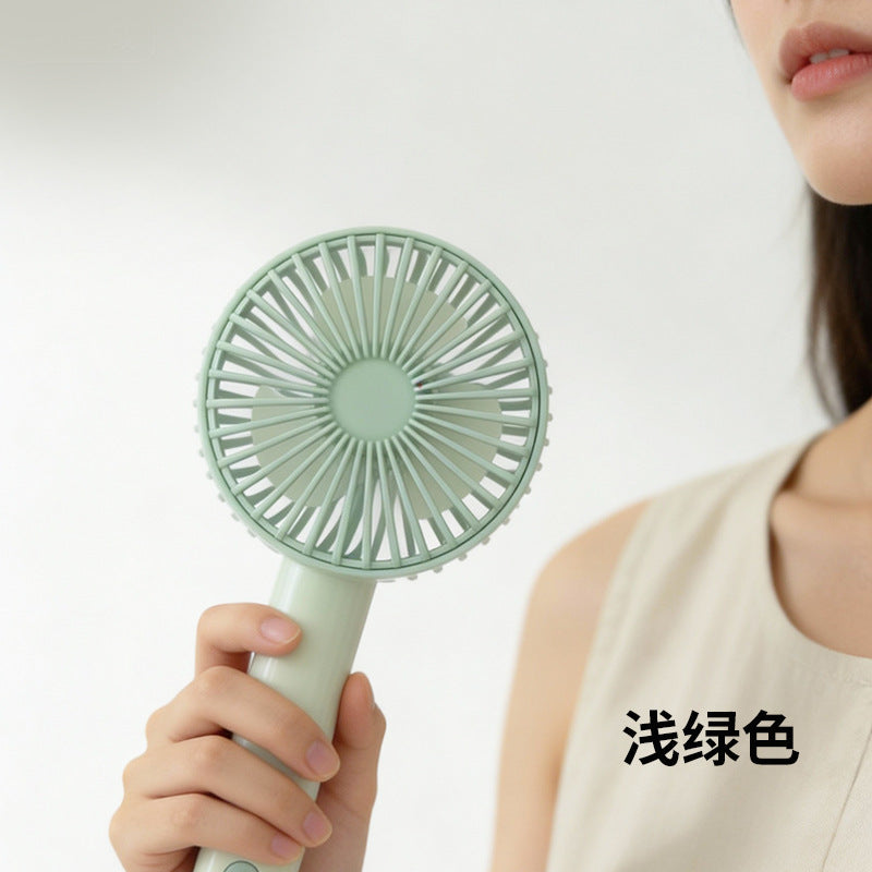Women's portable handheld fan with ergonomic grip and powerful battery technology Stornfield