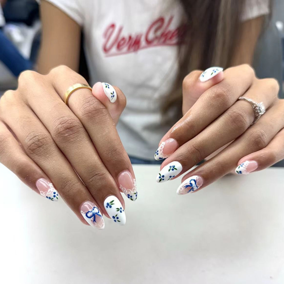 Artificial nails with charming flower and bow decor Stornfield