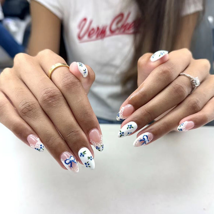 Artificial nails with charming flower and bow decor Stornfield