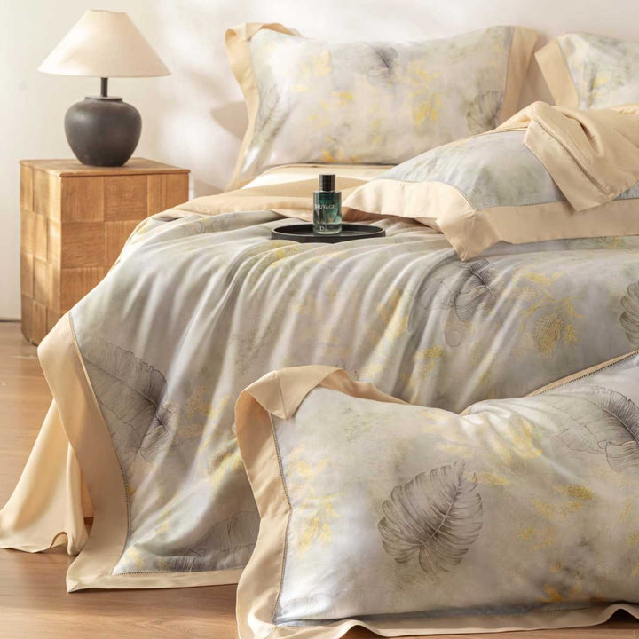 Luxurious cotton satin bedding set with delicate leaf design and hem detail