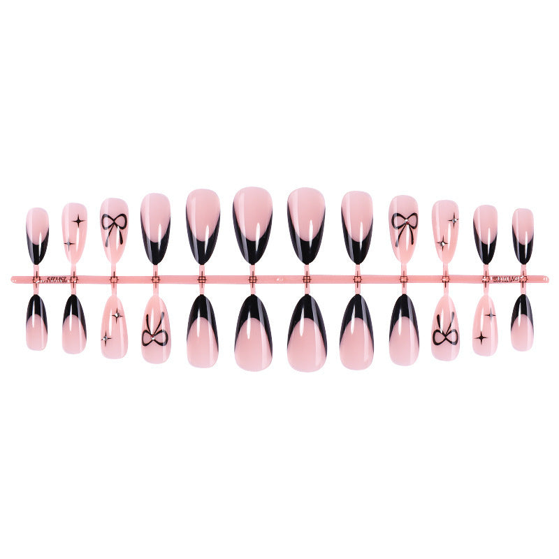Artificial nail set with elegant cut and bow decorations Stornfield