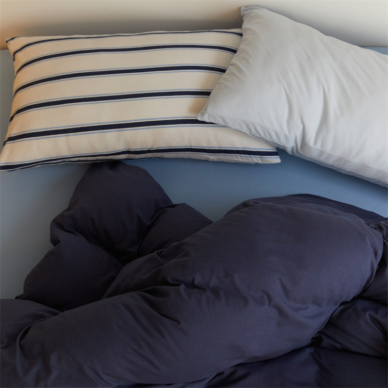 Bedding set made of cotton percale with striped pillowcase and smooth duvet cover