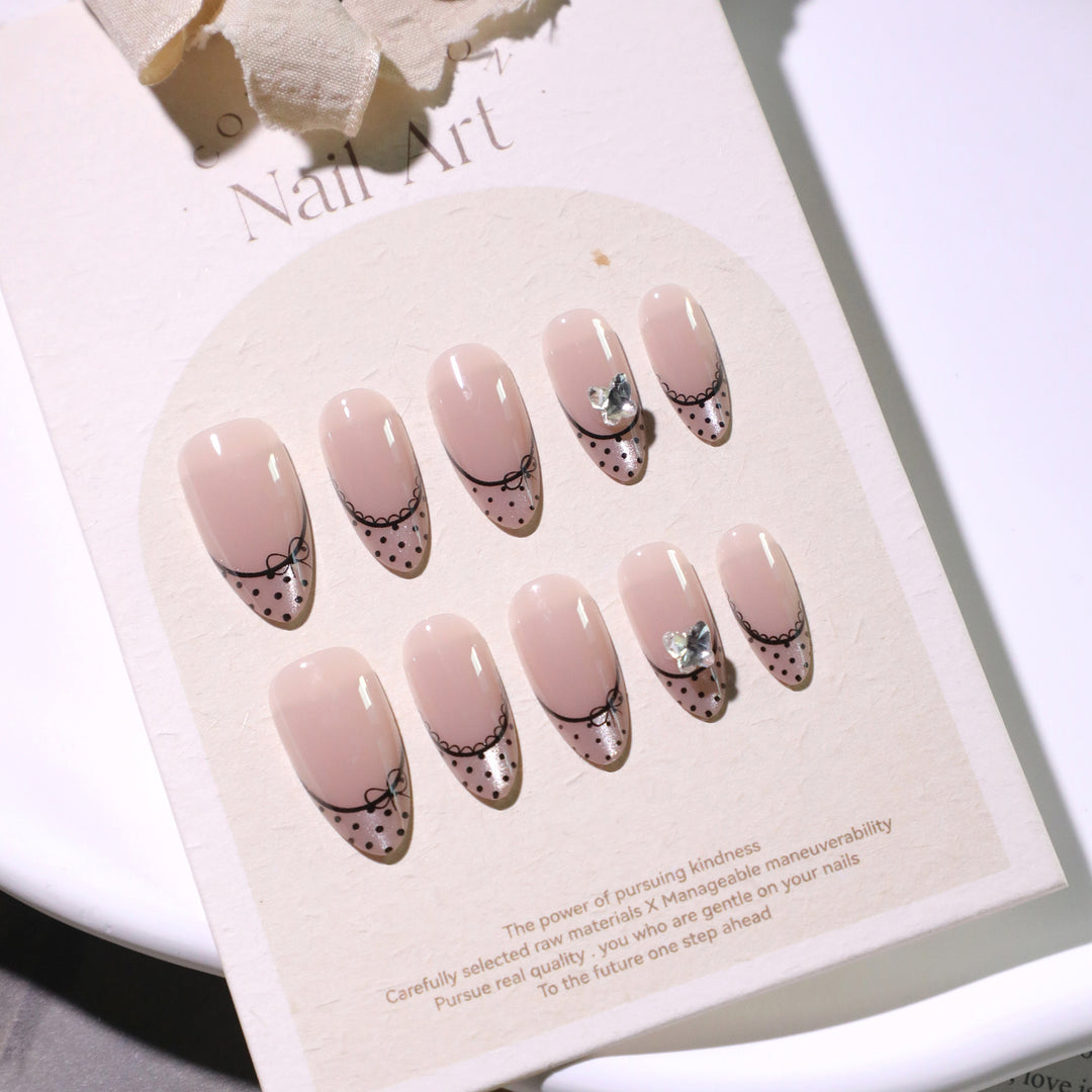 Elegant artificial nails with glitter and French design Stornfield