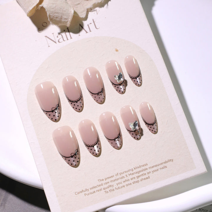 Elegant artificial nails with glitter and French design Stornfield