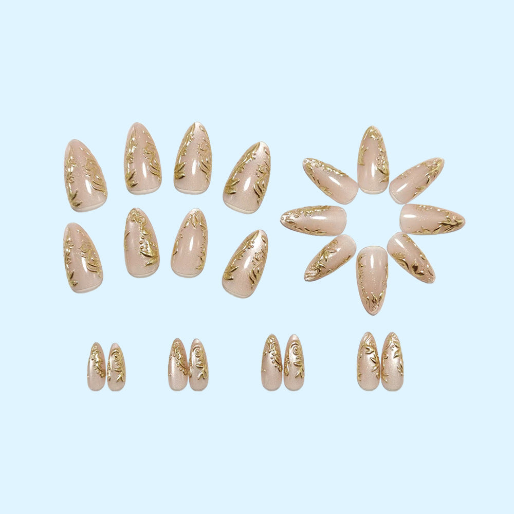 Glamorous artificial nails with delicate gold accents Stornfield