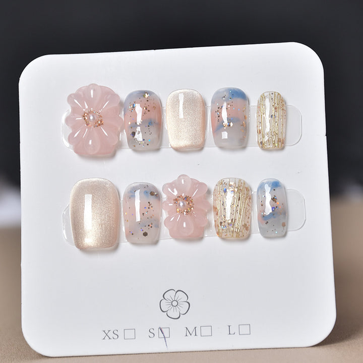 Elegant Nail Art Extensions with Pearl Accents Stornfield
