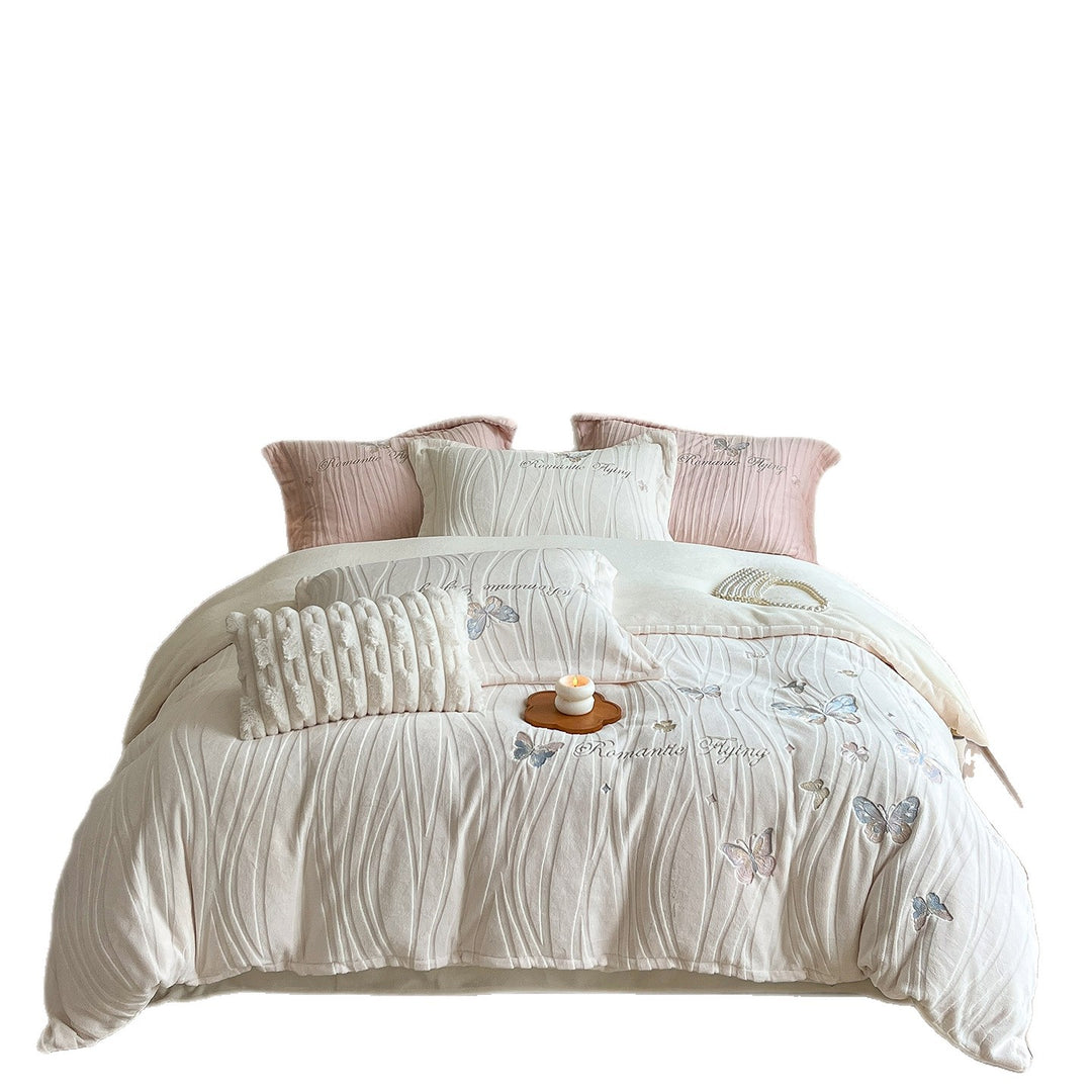Cozy microfiber bedding with embroidered butterfly designs