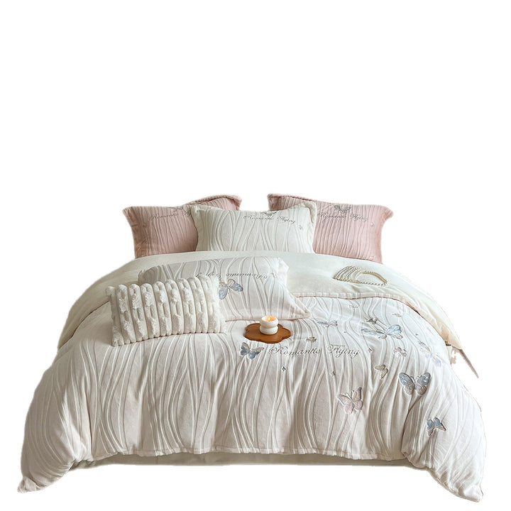 Cozy microfiber bedding with embroidered butterfly designs