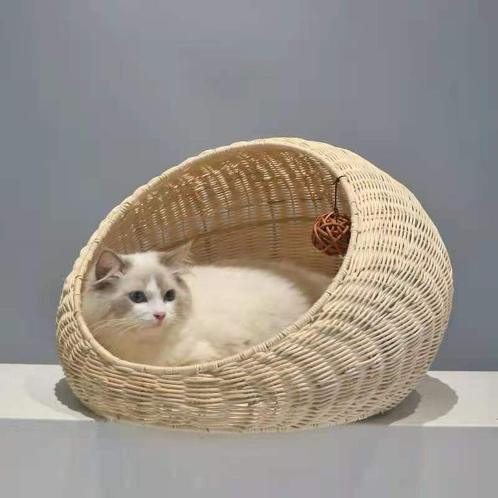 Cozy cat bed made of woven natural material Stornfield