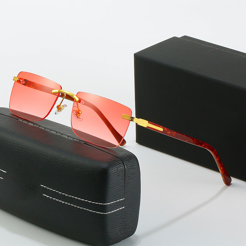 Women's fashionable sunglasses with a stylish, rectangular frame and elegant metal accents Stornfield