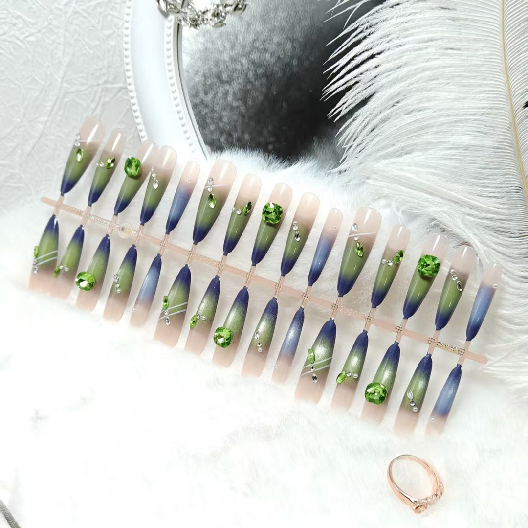 Artificial nails with elegant gradient color and glitter accents Stornfield