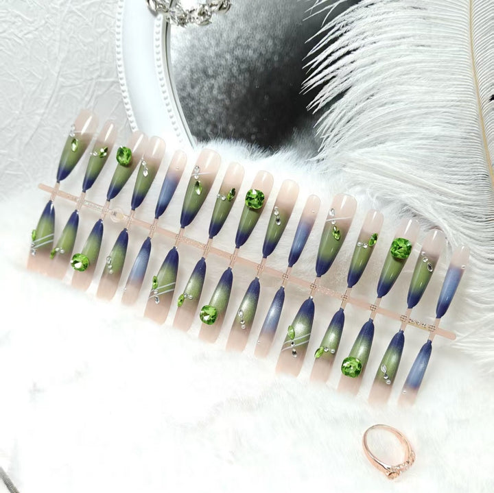 Artificial nails with elegant gradient color and glitter accents Stornfield