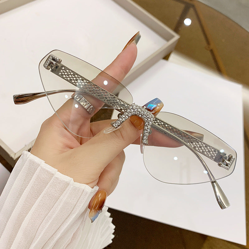 Women Designer Cat Eye Sunglasses with Sparkling Rhinestone Embellishment Stornfield