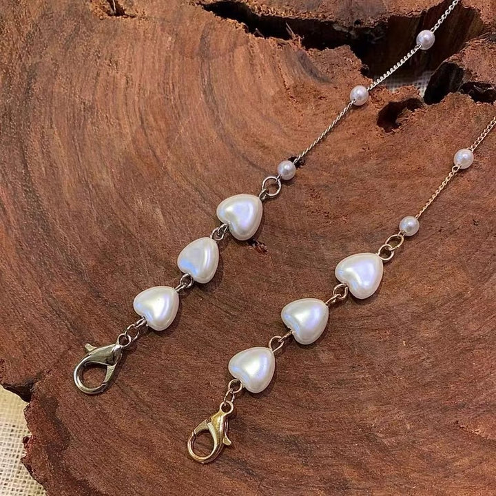 Stylish jewelry band with heart-shaped beads Stornfield
