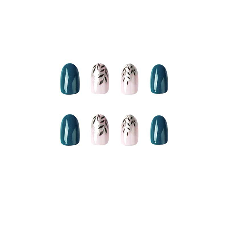 Elegant Nail Art with Floral Accent and Metallic Details Stornfield