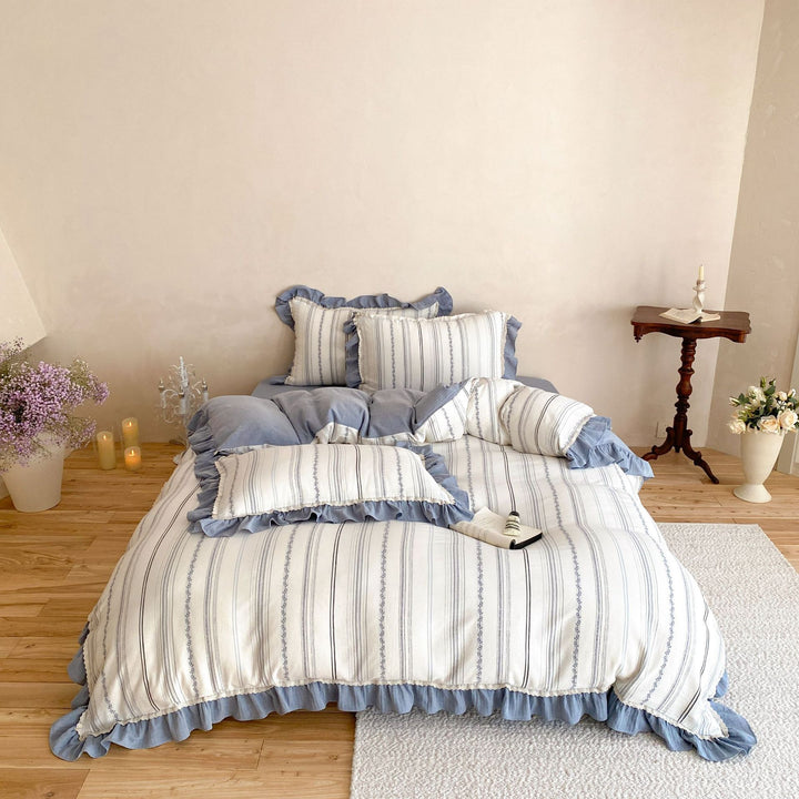 Cotton-linen bedding set with fine cherry embroidery and ruffled edge