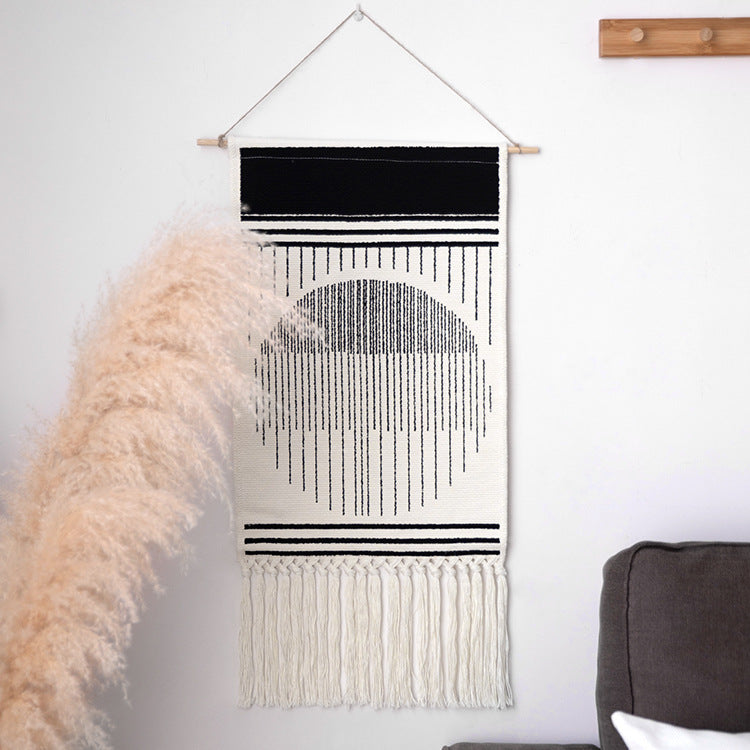 Woven Boho wall tapestry in Ethno design with long fringes and wood stick Stornfield