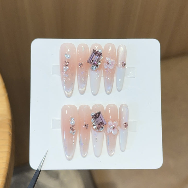 Artificial nails with elegant jewelry details Stornfield