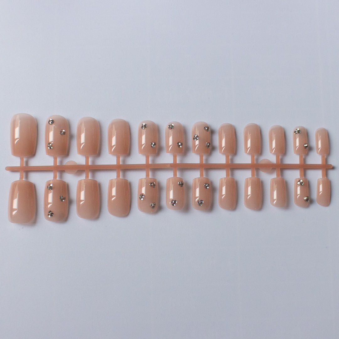 Decorative Nail Art with Rhinestone Accents