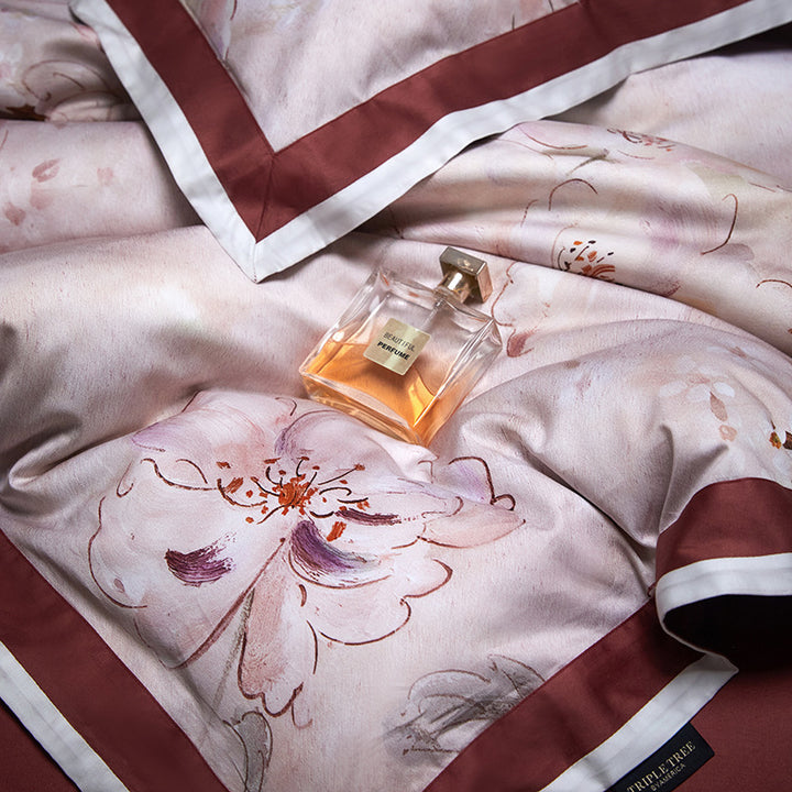 Fine woven satin bedding set with watercolor floral print, satin edge & hotel closure